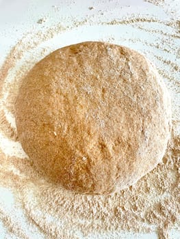 Sticky dough from whole wheat flour for dumplings. High quality photo