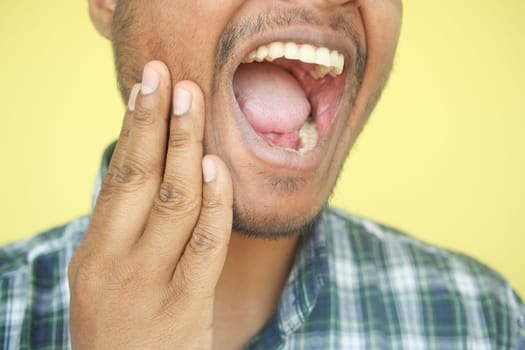 young man with sensitive teeth .