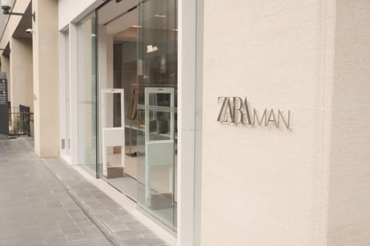 Turkey istanbul 18 july 2023., Zara store front featuring a metal sign in a modern font on a glass facade.