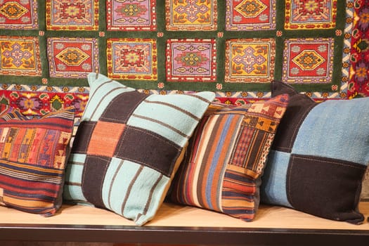 Colourful cushions on display for sale in a traditional Turkish Bazaar