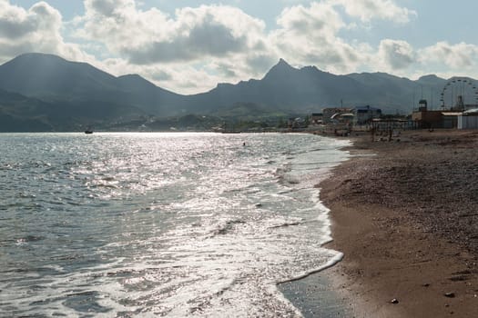 Beach Relaxation at the Black Sea. Fairy-tale Moments of a Sunny Day. The concept of tourism and sea travel.