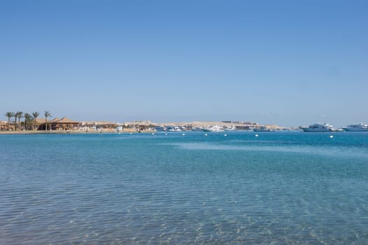 Beach Relaxation at the Red Sea. Fairy-tale Moments of a Sunny Day. The concept of tourism and sea travel.