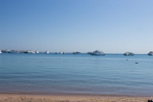 Beach Relaxation at the Red Sea. Fairy-tale Moments of a Sunny Day. The concept of tourism and sea travel.