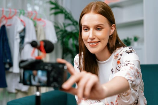 Woman influencer shoot live streaming vlog video review makeup utmost social media or blog. Happy young girl with cosmetics studio lighting for marketing recording session broadcasting online.