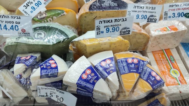 Beer Sheva Negev Israel July 11 2023, assortment of products, various cheeses for the holiday of Shavuot in Israel, food products in the supermarket. High quality photo