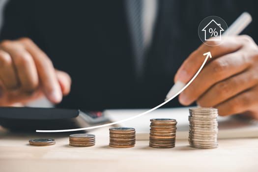 The real estate market upward trend is captured through a graph up arrow. A house model and coin stack convey inflation, economic growth, and insurance service pricing. Property value is ascending.