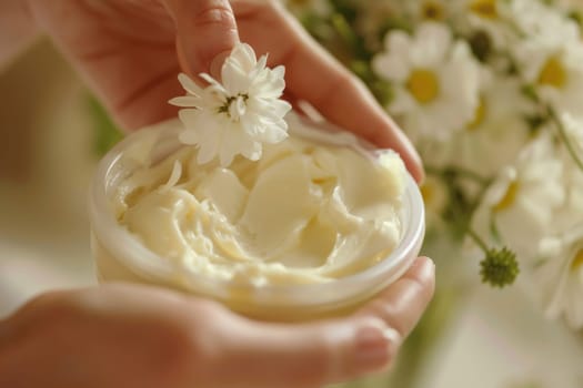 Tender hands cradle a jar of herbal cream among vibrant greenery, evoking themes of natural healing and alternative therapies