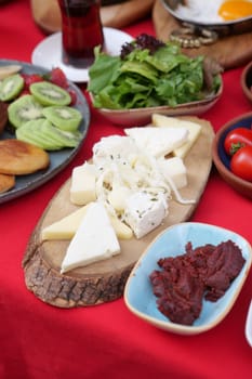 Cheese platter with different kinds of cheese.