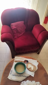 table, sandwich and coffee breakfast, red retro chair. High quality photo