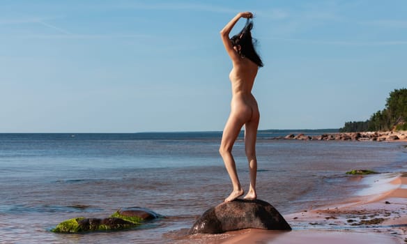 Young Beautiful Woman Posing Nude At The Seaside