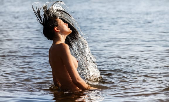 Young Beautiful Woman Posing Nude At The Seaside