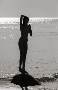 Young Beautiful Woman Posing Nude At The Seaside