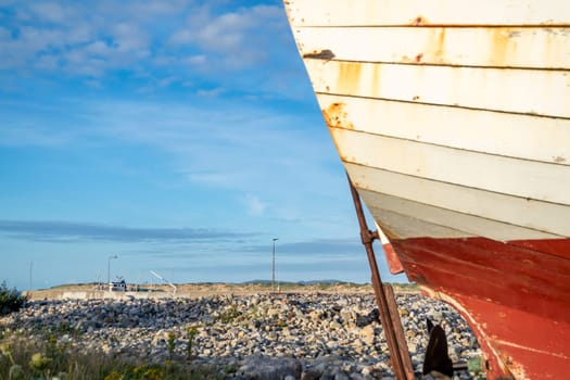 Old fishing vessel on dry land in County Donegal, Ireland.