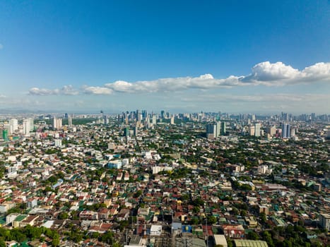 Manila is the capital of the Philippines with modern buildings and skyscrapers view from above. Philippines.