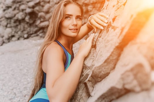 Woman travel sea. Young Happy woman in a long red dress posing on a beach near the sea on background of volcanic rocks, like in Iceland, sharing travel adventure journey