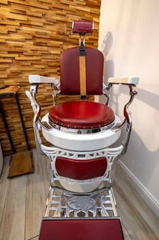 Stylish vintage barber chair. Barbershop theme
