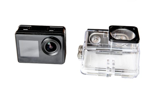 Action camera and a protected waterproof case, isolated on white