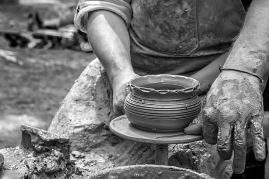 A master of pottery craftsmanship makes a jug. Pottery master class.