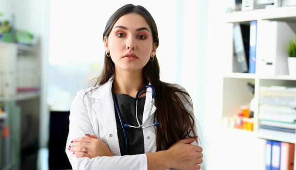 Beautiful smiling female doctor at workplace portrait. Physical and disease prevention patient aid exam visit 911 ward round prescribe remedy healthy lifestyle consultant profession concept