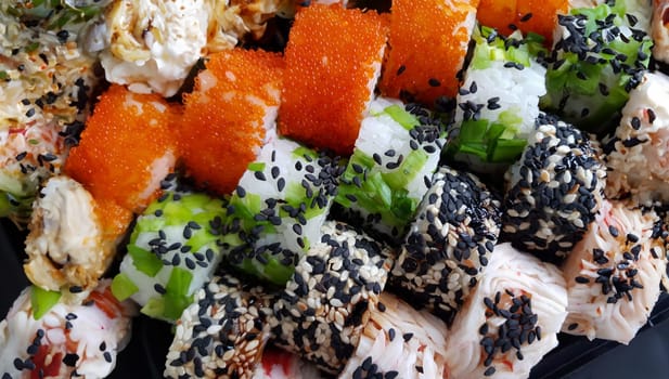 Fresh sushi rolls set food concept closeup