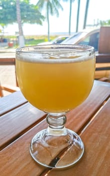 Glass with lime mint and ginger juice in Zicatela Puerto Escondido Oaxaca Mexico.