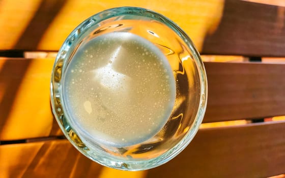 Glass with lime mint and ginger juice in Zicatela Puerto Escondido Oaxaca Mexico.