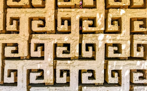 Texture pattern detail of a wall of rocks stones brick bricks brickwall marble art in Zicatela Puerto Escondido Oaxaca Mexico.