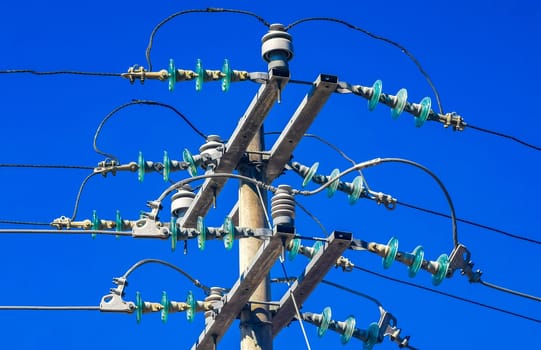 Power pole cable box with blue sky in Zicatela Puerto Escondido Oaxaca Mexico.