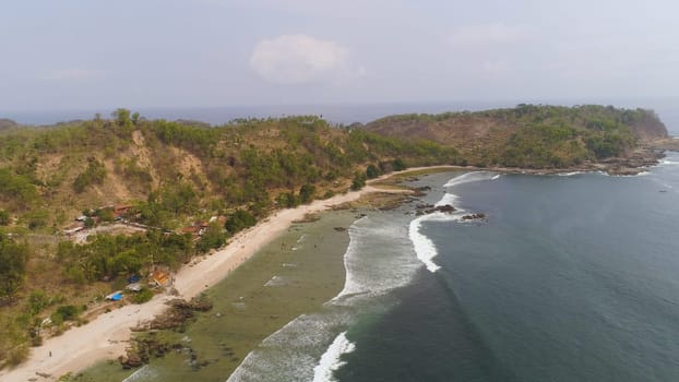 aerial seascape sand beach with turquoise water. Seascape, ocean and beautiful beach. Java Indonesia Travel concept.