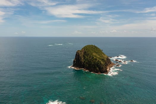 Aerial view of small island and blue sea. Santa Ana, Cagayan. Philippines.