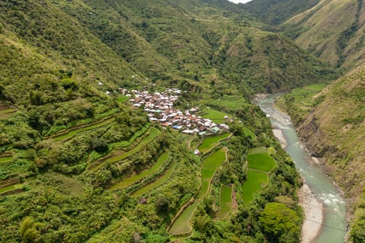 Mountains and rice fields against the blue sky. Philippines, Luzon.