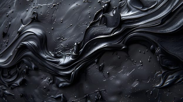 A detailed closeup of dark liquid resting on a black surface, creating a mesmerizing monochrome pattern in a dark and mysterious setting