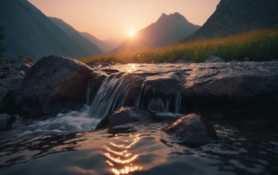 Mountain landscape at sunset. The sun goes down over the mountains.