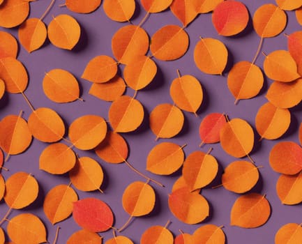 The image is a seamless pattern of yellow leaves on a gray background. - seamless and tileable
