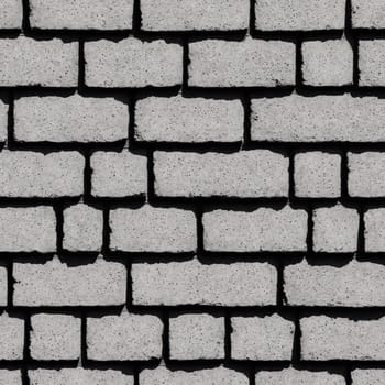 The image is a brick wall with a light gray color and no visible details. - seamless and tileable