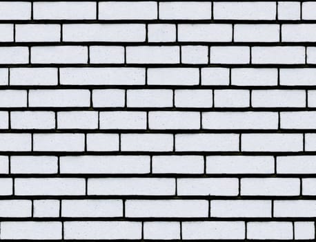 The image is a brick wall with a light gray color. - seamless and tileable