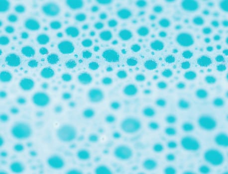 The image is a blue and white polka dot pattern. - seamless and tileable
