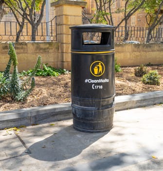 Valletta, Malta, April 03, 2024. a rubbish bin in the Maglio gardens in the city centre