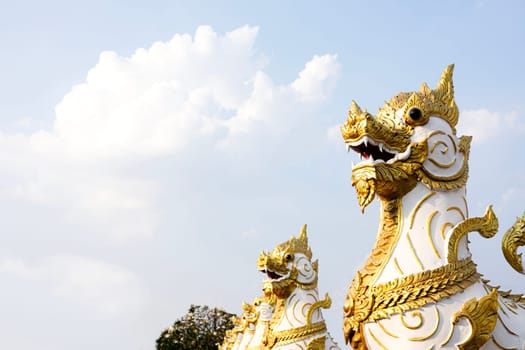 Thai lion statue in front of Phra That Choeng Chum temple at Sakon Nakhon Thailand.