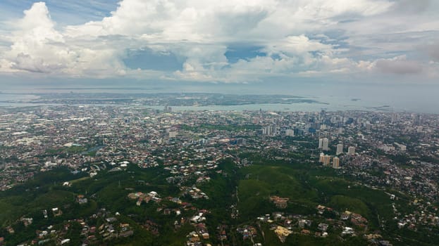 Aerial view of Cebu city with modern buildings, skyscrapers and business centers. Philippines.