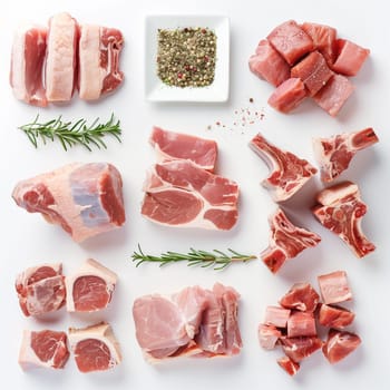 Various cuts of raw meats and assortment of spices laid out on a pristine white surface for cooking preparations.