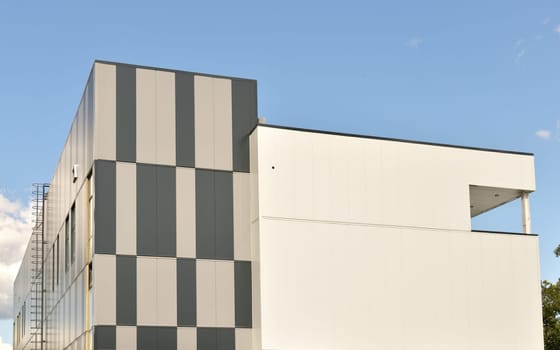 Fragment of a building with walls made of a sandwich panels