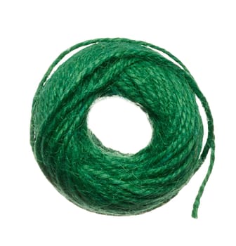 Skein of green thread on a white isolated background, top view