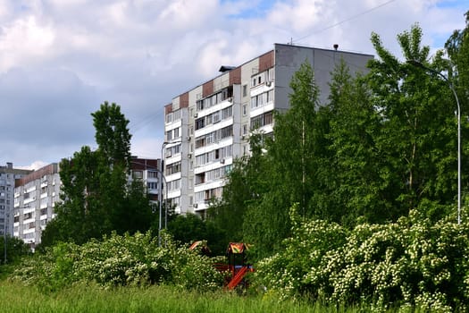 City houses surrounded by trees in the Moscow, Russia