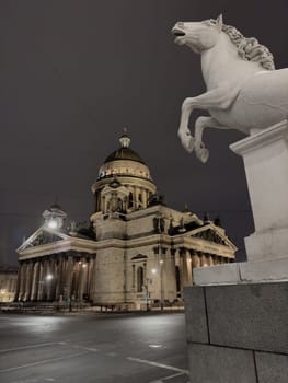Night view of frozen the monument St. Isaac's Cathedral in frost after severe frosts, Russia, St.Petersburg. High quality photo