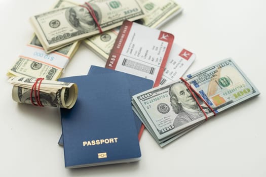 Travel concept. Passport with money on white background. High quality photo