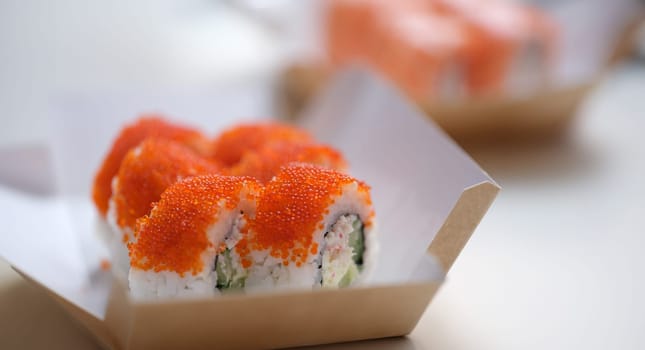 with flying fish roe lying on table closeup. Asian cuisine concept