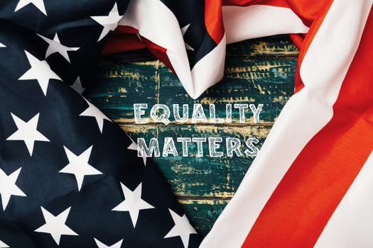 A heart made out of stars and stripes with the words equality matters written underneath. The image conveys a message of love and unity, emphasizing the importance of treating everyone equally
