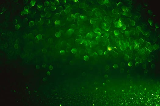 A green background with many small green dots. The dots are scattered all over the background, creating a sense of movement and energy. Scene is lively and dynamic