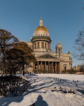 Snow-covered Park in front of St. Isaac's Cathedral in St. Petersburg - Russia in the spring sun. High quality photo